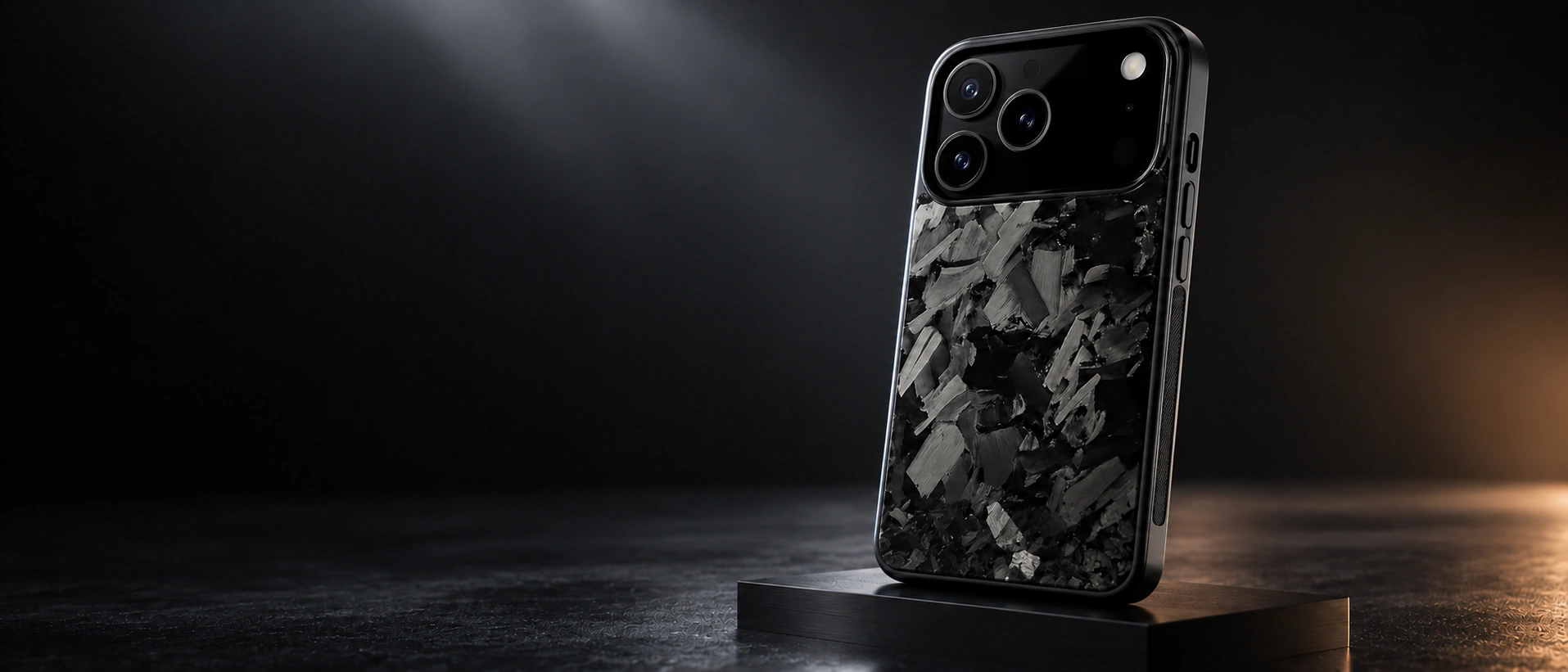 iPhone 17 Pro в чехле из чёрного кованого карбона на тёмном подиуме